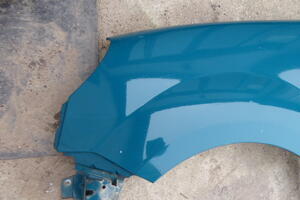 BŁOTNIK PRZÓD LEWY